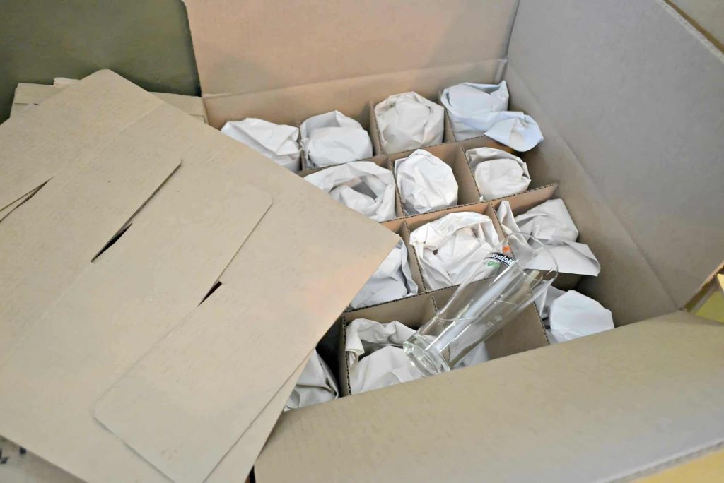 How to pack wine glasses in storage boxes?
